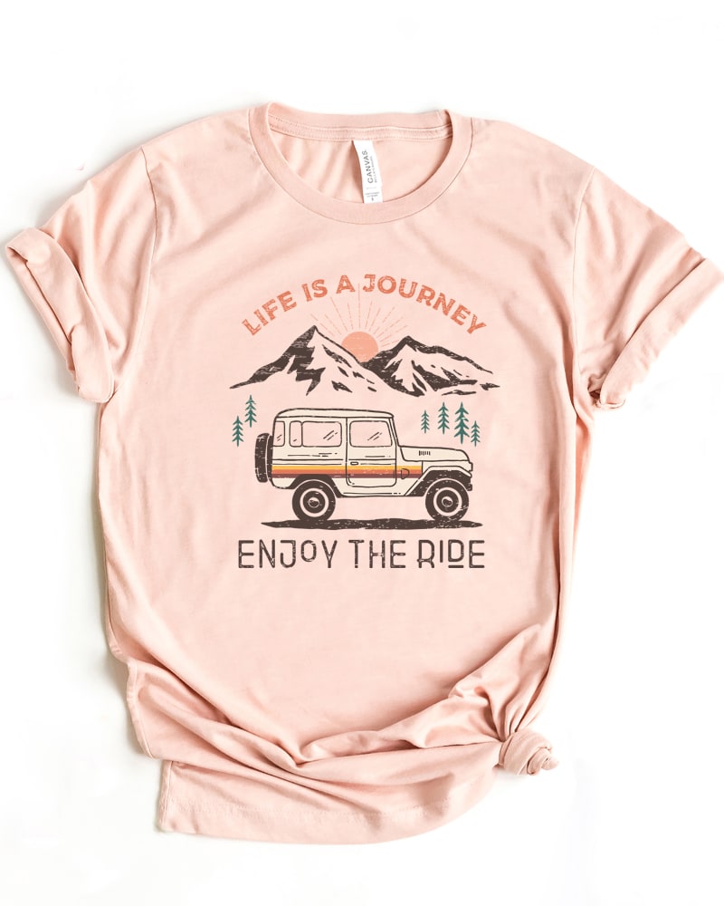 Front of a size L Life Is A Journey Short Sleeve Graphic Tee in Blush by Simply Sage Market. | dia_product_style_image_id:296472